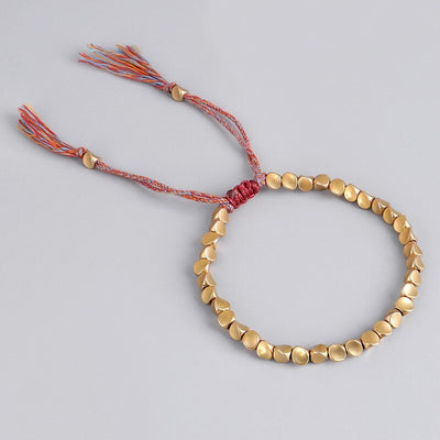 "Harmonie sacrée" - Bracelet luxe traditionnel bouddhiste en perles de cuivre
