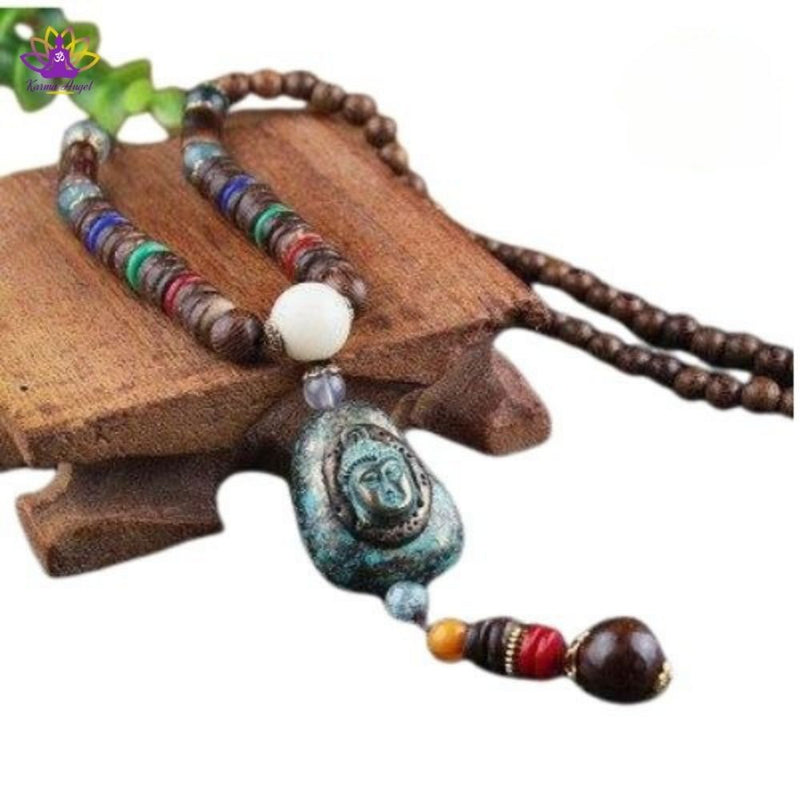 "Prière apaisante" - Collier long tête de bouddha, pierres et perles de bois