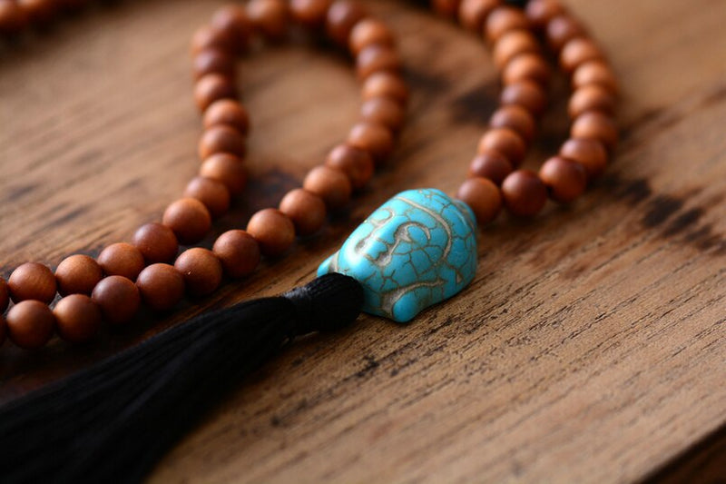 Collier Mala traditionnel en bois et tête de bouddha