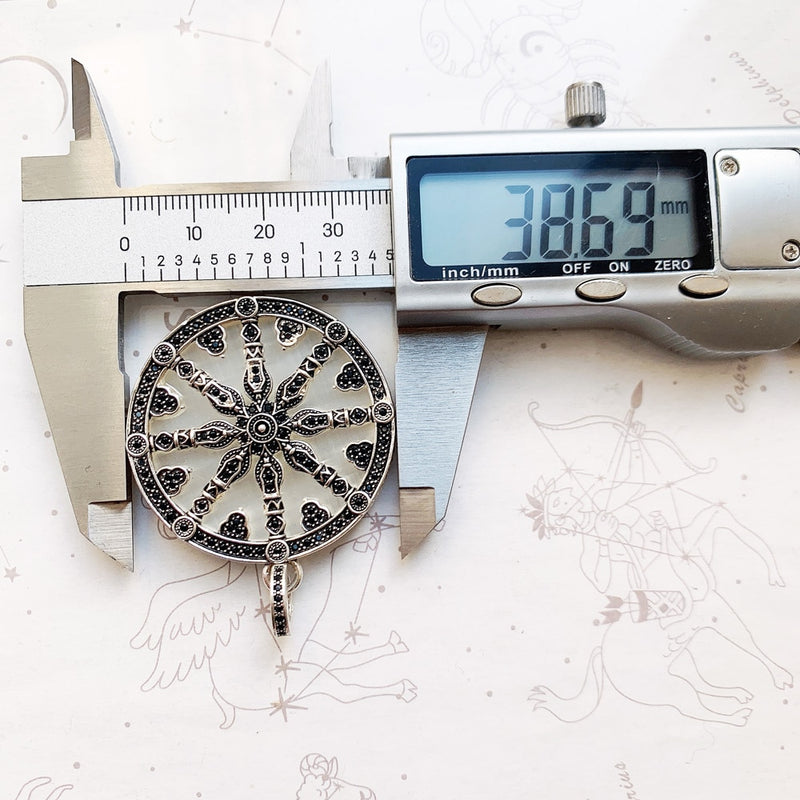 "Bonnes actions" - Pendentif roue de Karma en argent massif